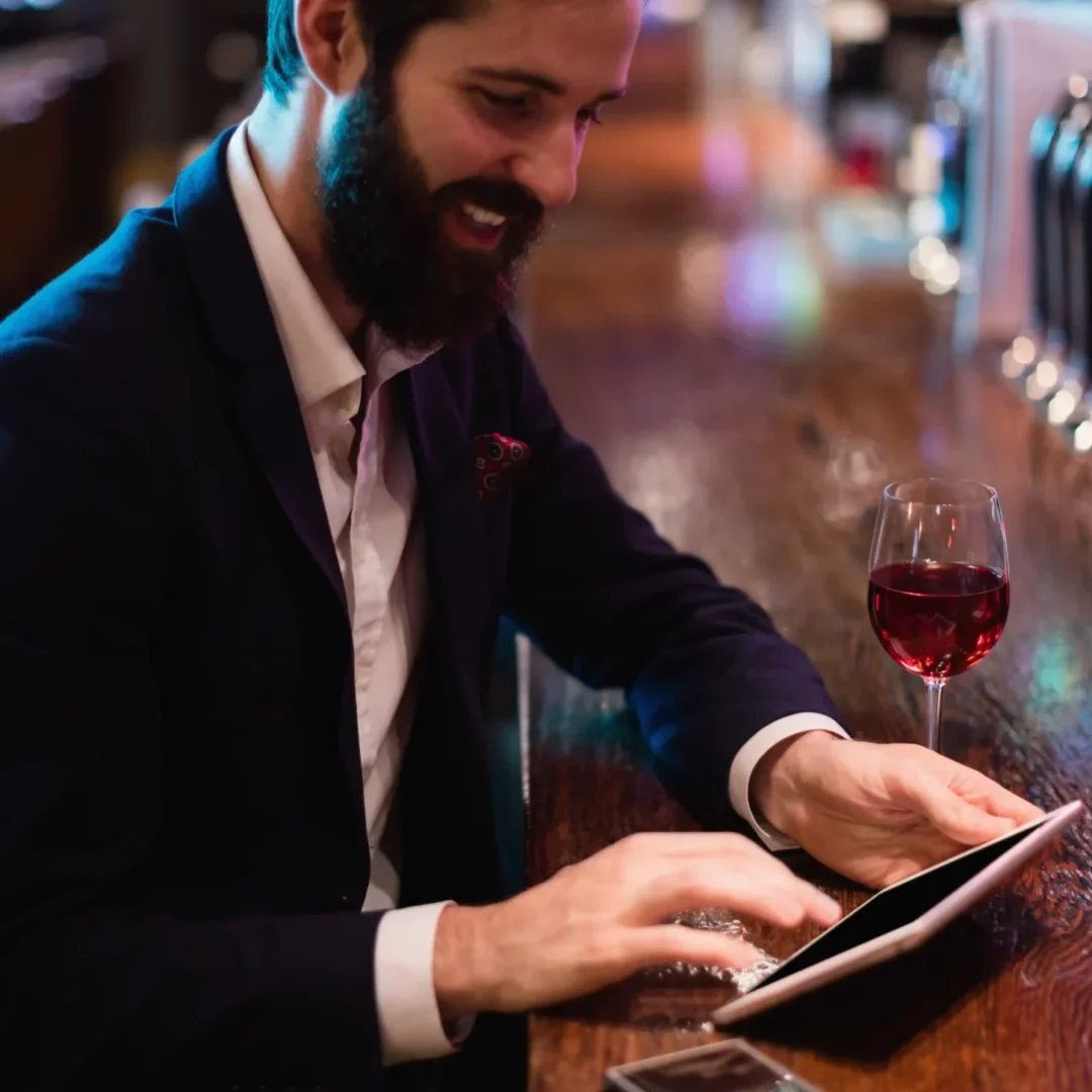 businessman-using-digital-tablet-with-wine-glass-mobile-phone-counter-scaled.webp businessman-using-digital-tablet-with-wine-glass-mobile-phone-counter-scaled.webp